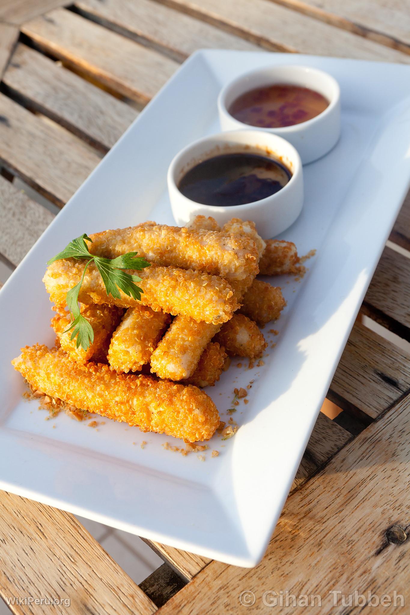 Pescado empanizado con quinua